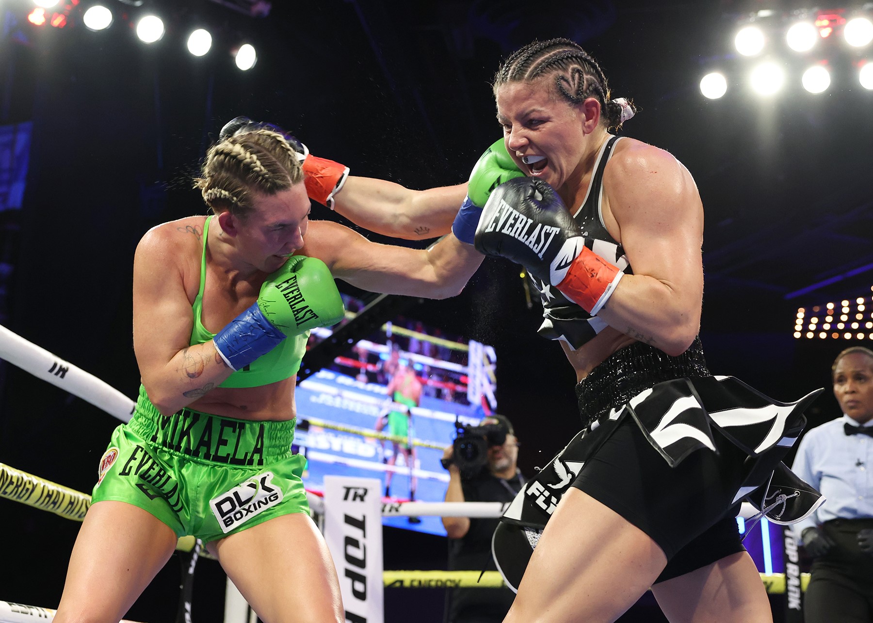 Mikaela Mayer defeats Sandy Ryan to become two-weight world champion