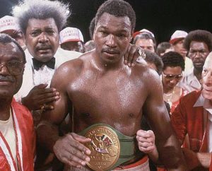 larry holmes with don king