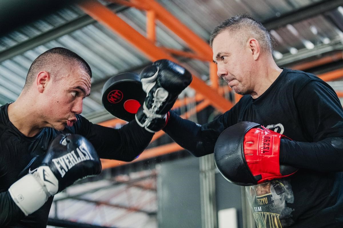 Kostya Tszyu tries to break his son Tim during training camp for Bakhram Murtazaliev fight